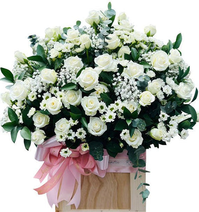 White Roses In A Basket